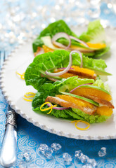Chicken salad on lettuce leaves