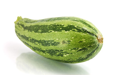 Green zucchini isolated on white