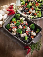 ink squid tagliatelle with sepia and broccoli