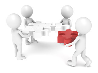 The Team solving a jigsaw puzzle. Red