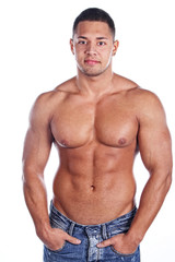 Fototapeta premium Portrait of a macho man against white background