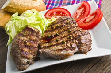 Juicy steak with green pepper