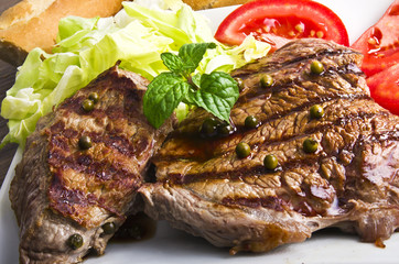 Juicy steak with green pepper