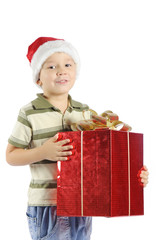 little boy in Santa Claus hat