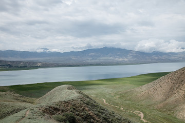 Toktogul highland mountain lake in Kyrgyzstan