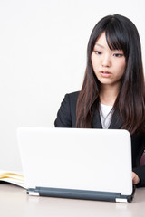 asian businesswoman with laptop computer