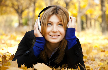 Portrait of a woman at outdoor with headphones