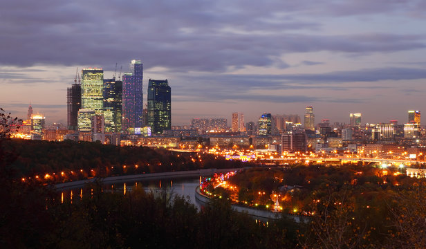 Evening panorama of Moscow City complex of skyscrapers and river