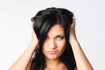 Naklejka premium Portrait of a young beautiful but very dissatisfied girl