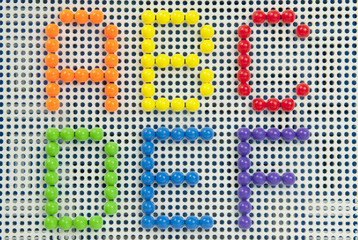 letter a dots pattern in bright colours.
