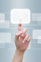 hand pressing a button on a touch screen interface