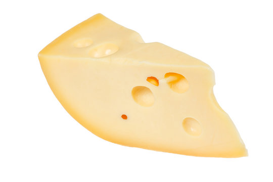 A piece of fresh cheese on a white background