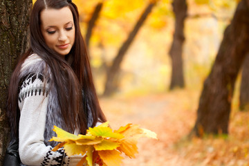 smiling woman in autmn park