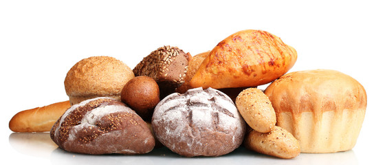 tasty breads and rolls isolated on white