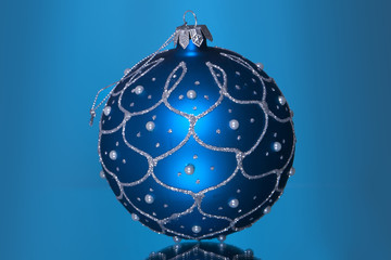 blue christmas balls on a dark blue background