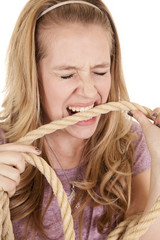 girl bite rope