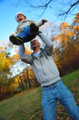 Fototapeta premium father, son, learning to fly