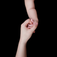 mother's and baby's hands