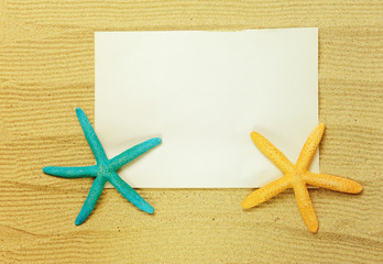 starfish and shells with frame on the beach, vacation memories .