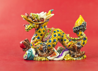 Colorful chinese dragon statue on white background