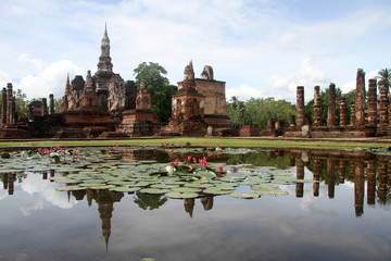 Fototapeta na wymiar Pond with lotuses and ruins