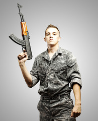 young soldier aiming