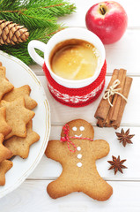 Gingerbread cookie and cup of coffee