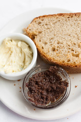 Sauces and bread on the plate