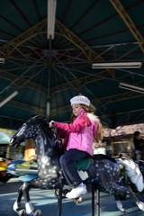 girl on carousel