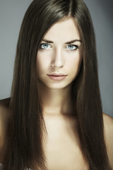 Naklejka premium Fashion portrait of young beautiful woman. Close-up