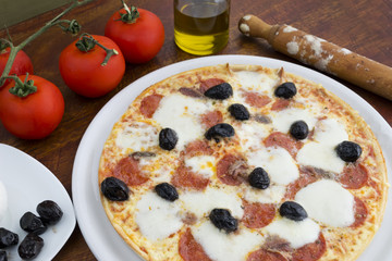 pizza on wooden table