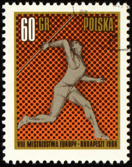 Javelin throwing on post stamp