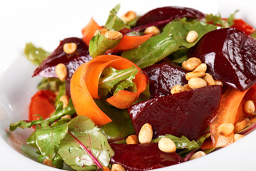 Fresh vegetable salad in a white plate