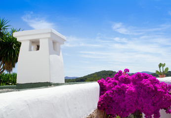Ibiza white houses and flowers in Sant Miquel
