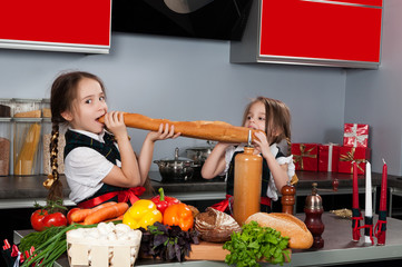 Two little girl in the kitchen