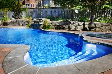 Swimming pool with waterfall © Elenathewise