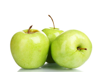 juicy green apples isolated on white