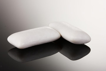 Chewing gums on gray background