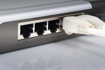 Network switch plugs closeup.