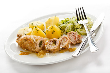 Roasted stuffed pork chop and vegetables