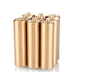 golden batteries isolated on white