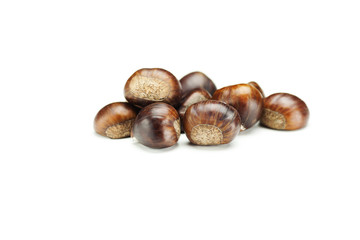 big shiny chestnuts isolated on white