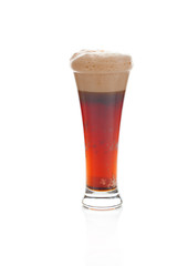 dark beer with the foam in a tall glass isolated on white