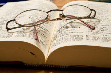 Glasses and book