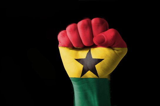 Fist painted in colors of  ghana flag