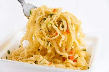 Delicious noodle cooking with spices. Macro shot