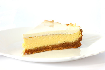 Layered cheesecake case on white plate