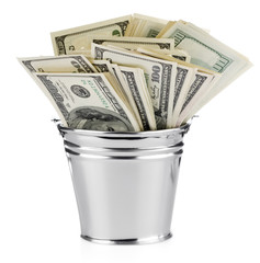 Isolated bucket of US banknotes - 36816851