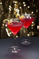 Cosmopolitan cocktail with lemon garnish
