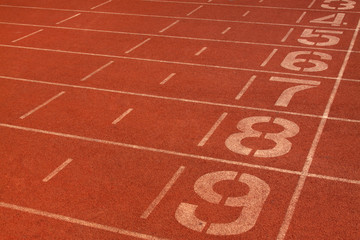 red plastic runway and numbers in a sports ground, in Beijing, C